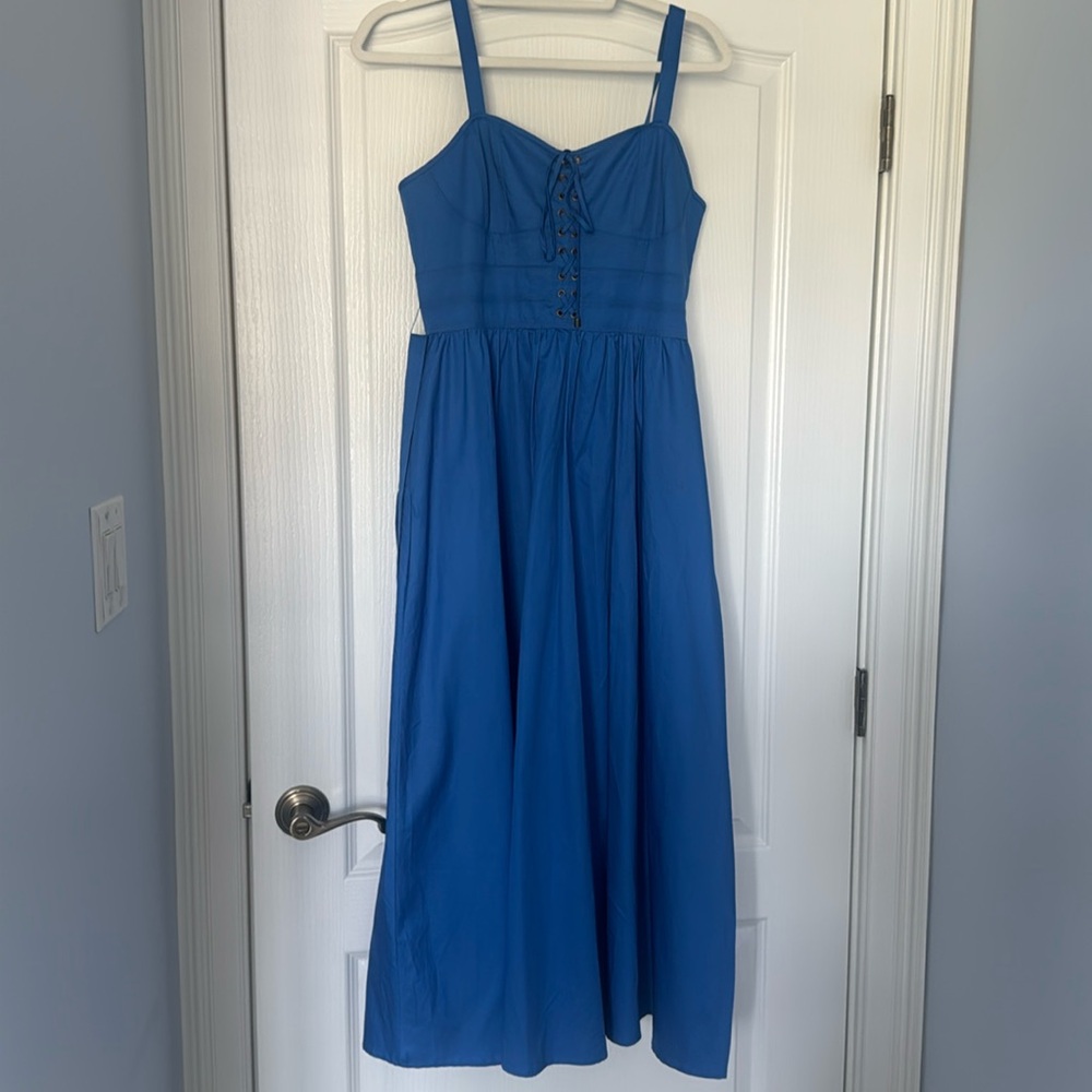 Wore once. Beautiful shade of blue.